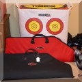 L16. Genesis Archery target and bows. 